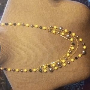 Pearlesque necklace multiple strands